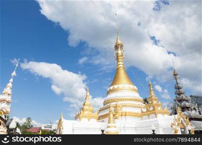 White Pagoda architectural design of Thailand. During the daytime sky