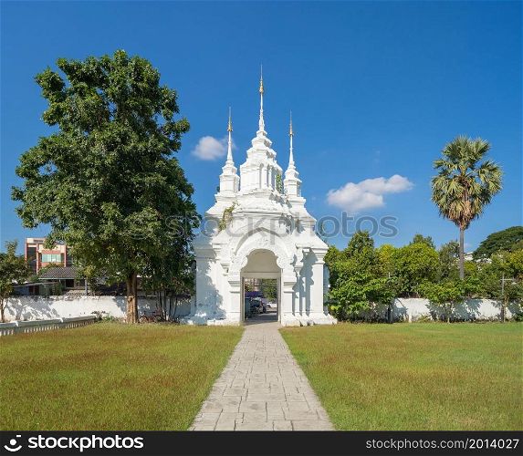 White pagoda or stupa of Wat Suan Dok buddhist Temple, Chiang Mai City, Thailand. Thai architecture. Tourist attraction landmark.