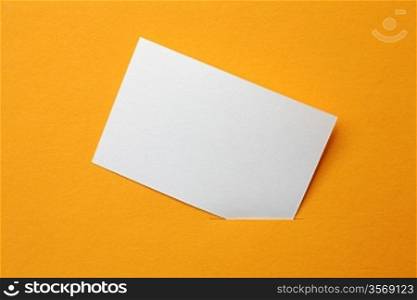 white paper card on orange background