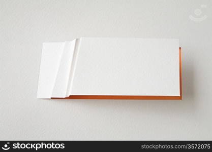 white paper card on red background