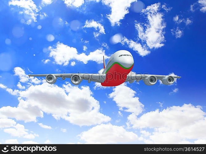 White passenger plane flying in the blue sky with white clouds around