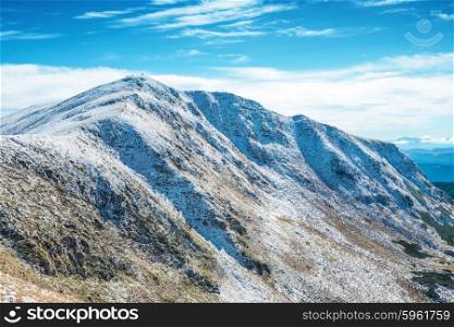 White peaks of mountains in snow. Winter landscape
