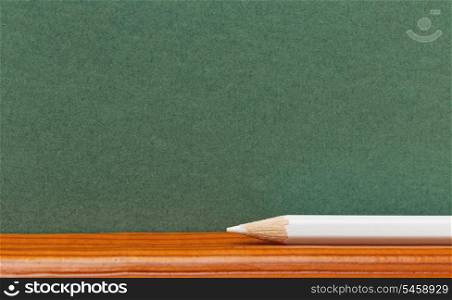 white pencils on a school desk