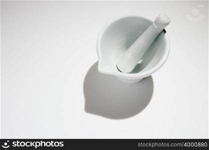 White pestle and mortar