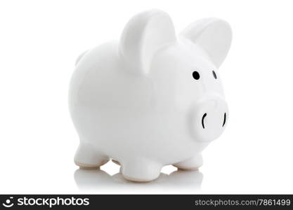 White piggy bank with reflection on white background