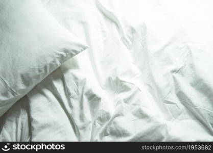 White Pillow On Bed And With Wrinkle Messy Blanket In Bedroom, From Sleeping In A Long Night Winter.