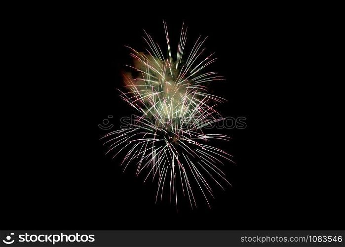 White Pink Sparkling Fireworks Background on Night Scene. Abstract color fireworks background and smoke on sky