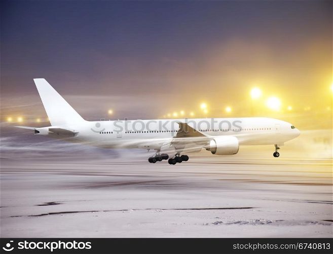 white plane in airport at non-flying weather, snow-storm