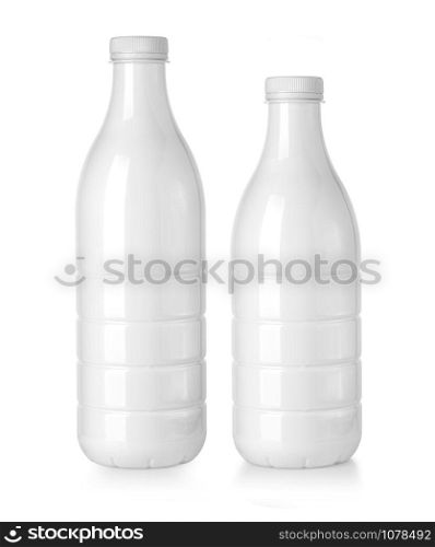 White plastc bottles with milk isolated on white background
