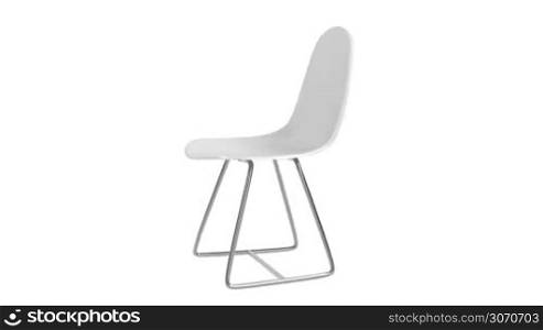 White plastic chair spin on white background
