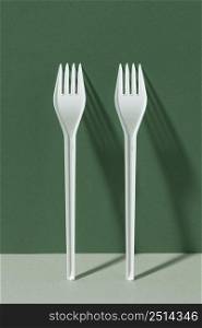 white plastic forks front view