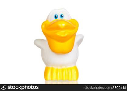White plastic pelican isolated on a over white background