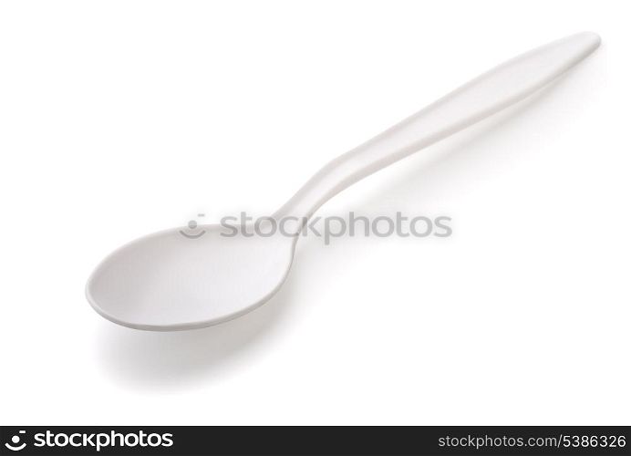 White plastic tea spoon isolated on white
