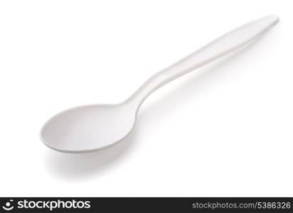 White plastic tea spoon isolated on white