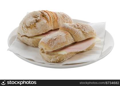 White plate of ham and cheese sandwiches isolated on white background.
