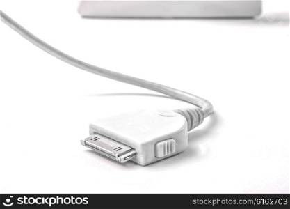White plug-in, for power supply of Apple Pruducts, on a white background.