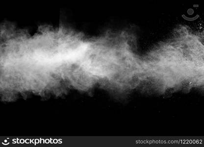 White powder explosion on black background.