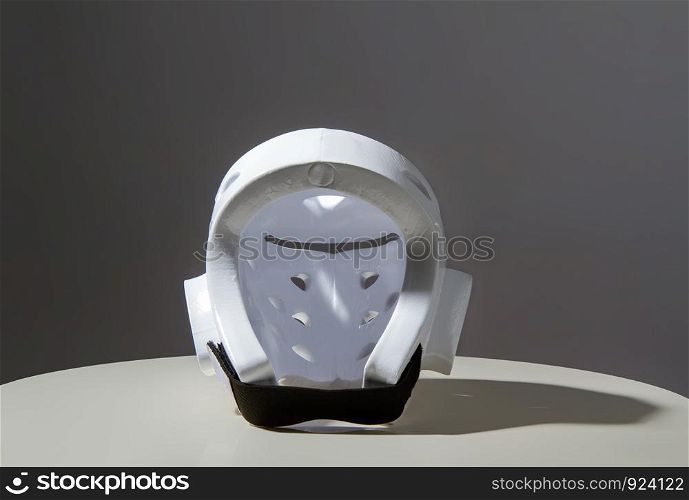White protective light helmet for karate do, for training and competition. New mandatory requirement in some clubs. White helmet for karate