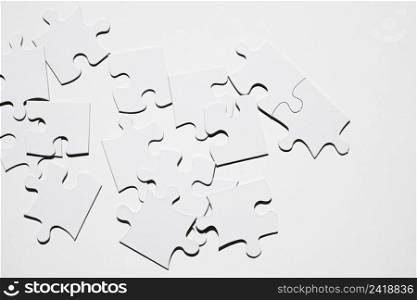 white puzzle pieces isolated white surface