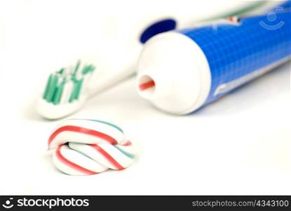 white red and blue squeezed toothpaste isolated on a white background