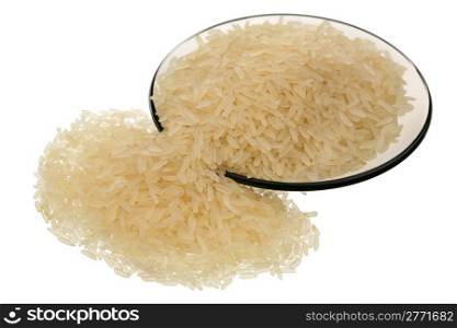 White rice and glass saucer are isolated on a white background