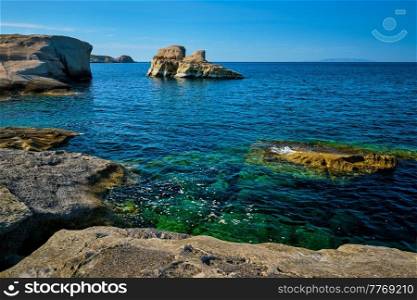 White rocks of famous tourist attraction of Milos island Sarakiniko beach and Aegean sea, Milos island , Reece. Famous Sarakiniko beach on Milos island in Greece