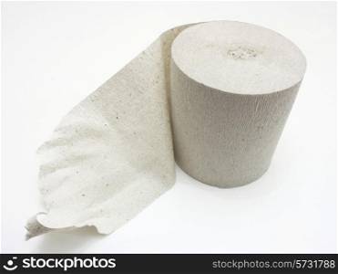 White roll of toilet paper isolated on white material;
