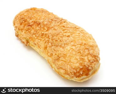 White roll strewed by sugar with a ruddy crust on a white background