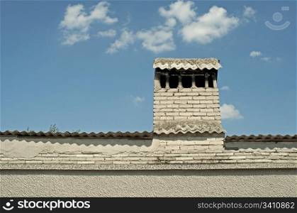 White roof with chimney. Horizontal image