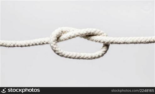 white ropes with overhand knot