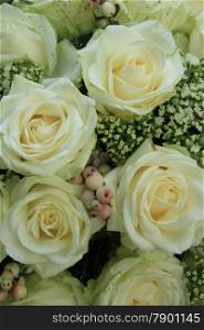 White roses and gypsophila in a bridal bouquet