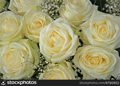 White roses, mixed with green in a bridal bouquet