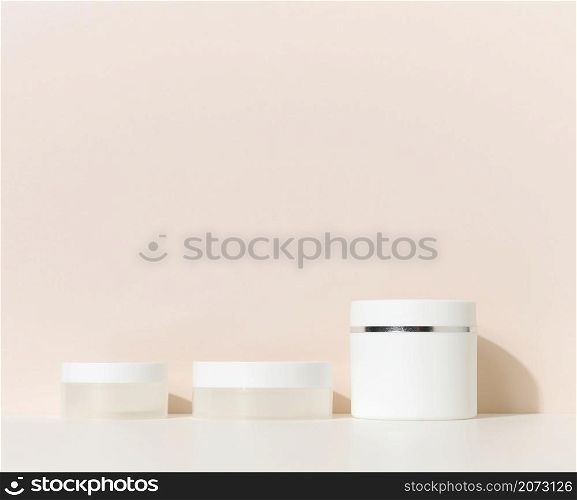 white round plastic jar for cosmetic products. Blank for branding products, mock up