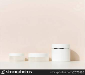 white round plastic jar for cosmetic products. Blank for branding products, mock up