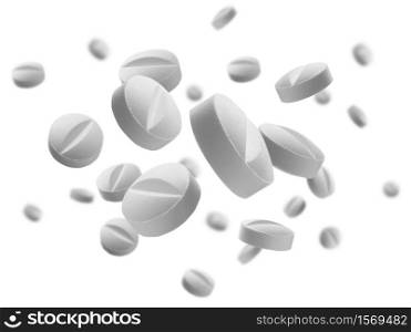 White round tablets levitate on a white background.. White round tablets levitate on a white background
