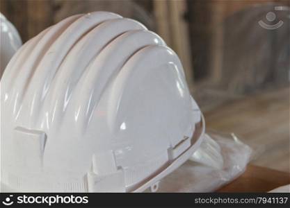 White safety helmet for protection on a construction workplace