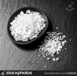 white salt on black background