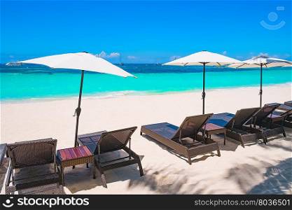 White sand beach with umbrellas, Boracay island, Philippines