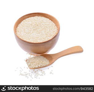 white sesame in wooden bowl on white background