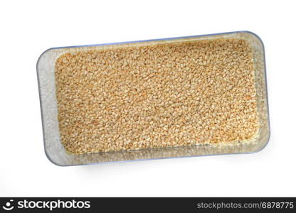 white sesame seeds in box with clipping path
