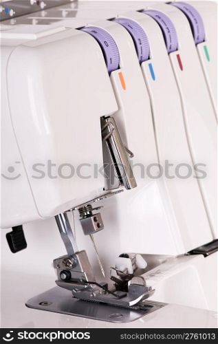 white sewing- machine isolated on white background