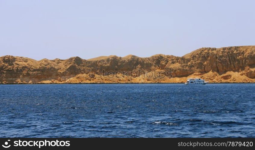 White Ship Moving By The Red Sea