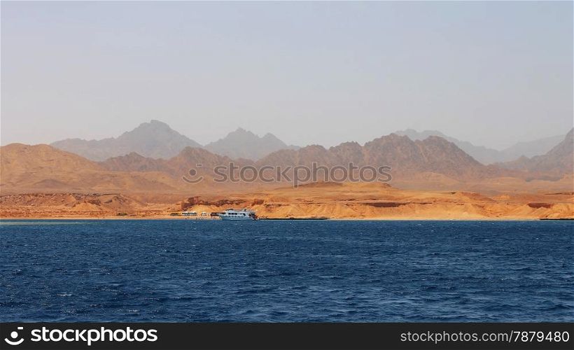 White Ship Moving By The Red Sea