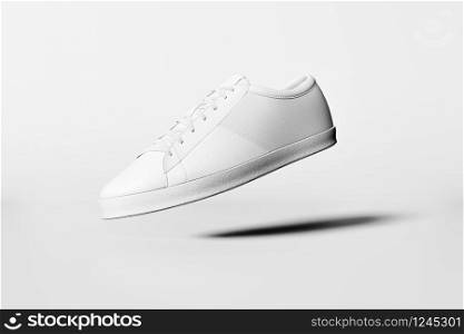 White shoes isolated on white background. Minimal concept idea. 3D rendering.