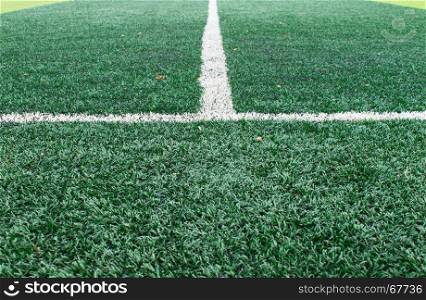 White sideline on green football field. Sideline on green artificial grass background