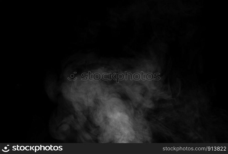 White smoke on dark background.