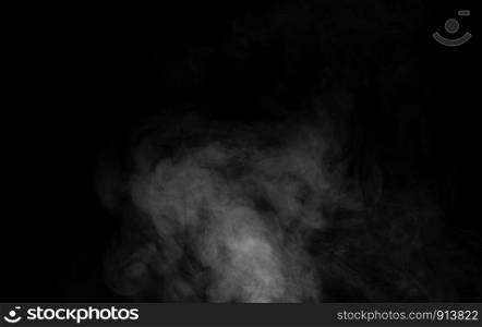 White smoke on dark background.