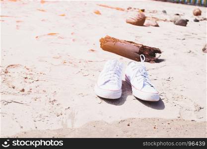 White sneakers on the beach, Lifestyle