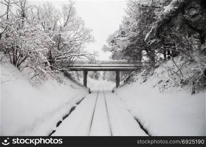 White Snow covered tracks on Tsugaru railway line in Aomori, Tohoku, Japan