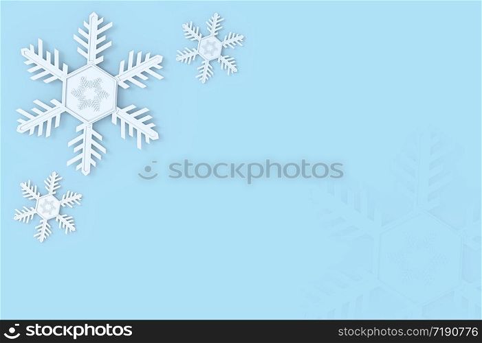 White snowflake decorating on soft blue copy space background.